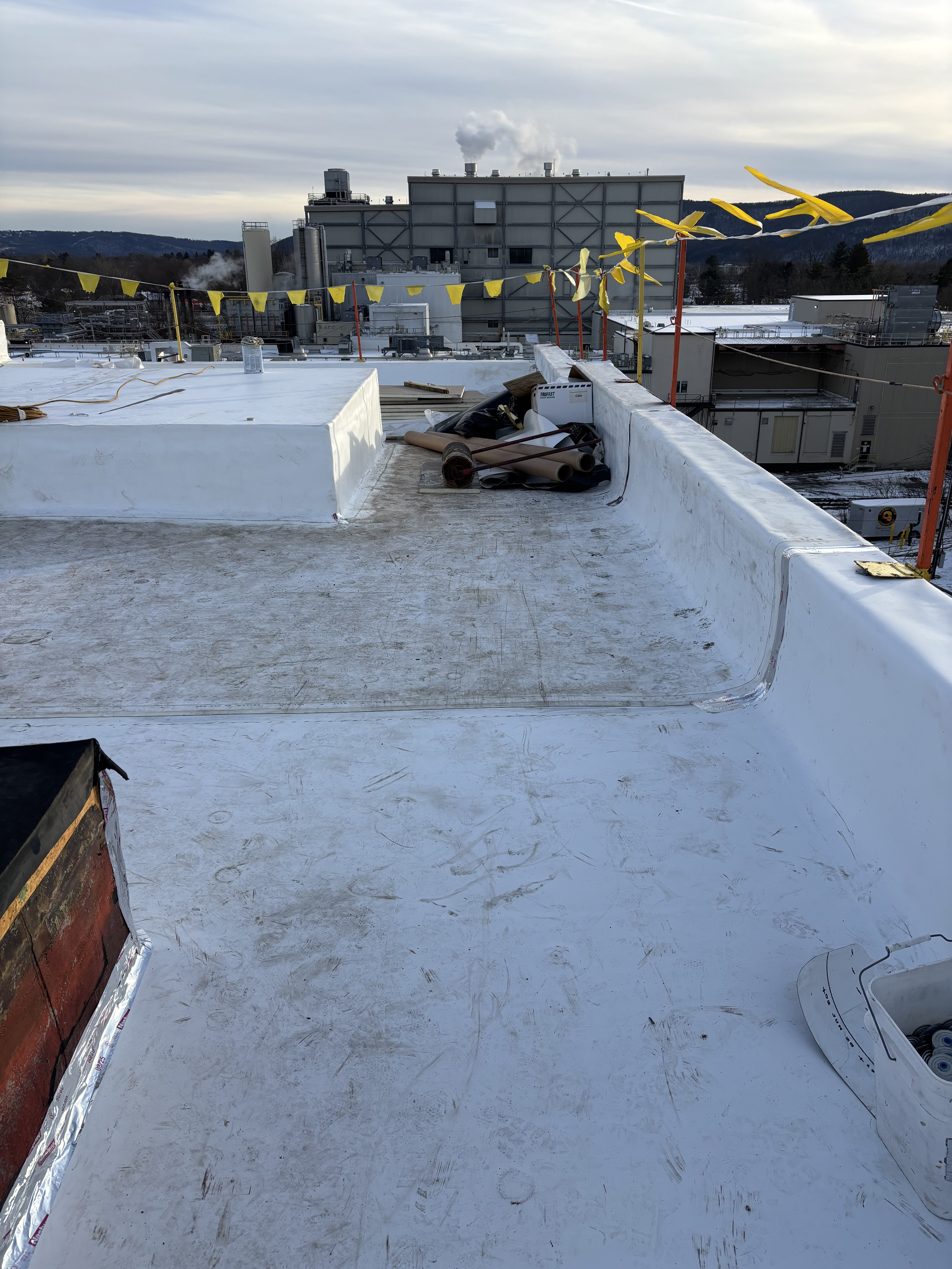 Looking south across Broad St over the southwest corner of the upper roof.